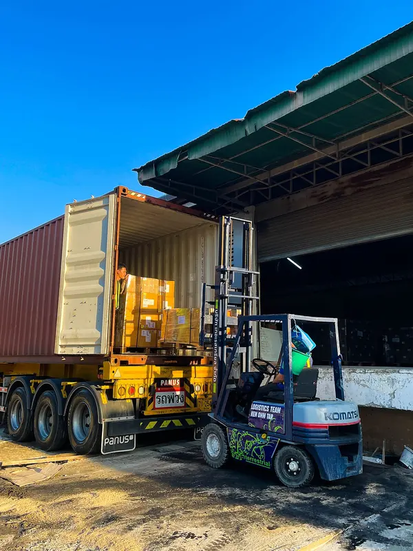 Container loading with forklift at warehouse in Thailand.jpg